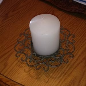 3 for $15. Candle holder and candle